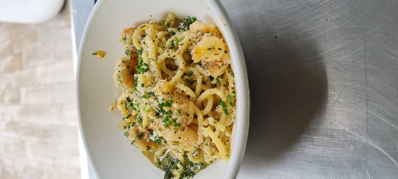 Prawn spaghetti with chives and parmesan